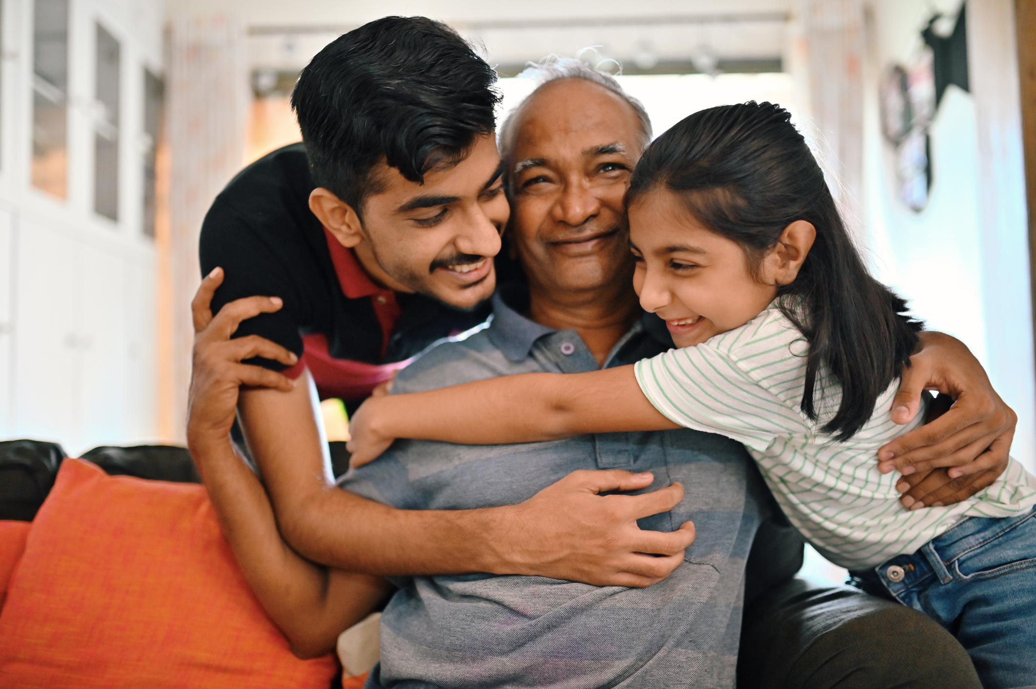 happy older man with grandkids