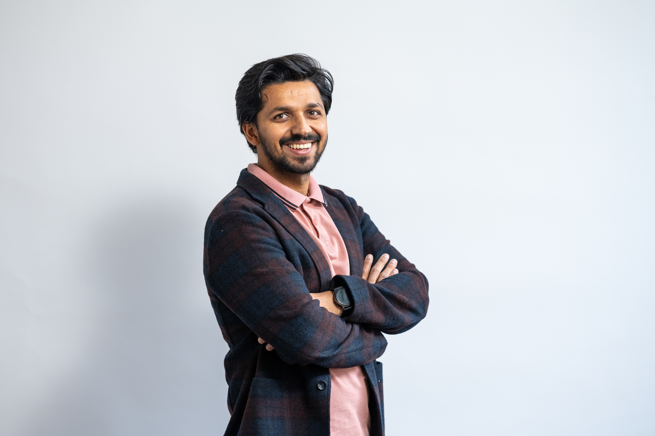 Confident Indian Man Smiling in Stylish Formal Attire